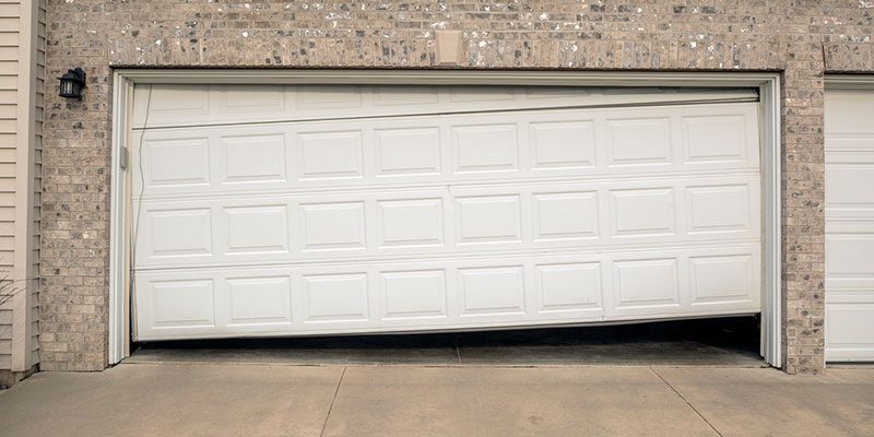Four Signs That You Need a Garage Door Replacement
